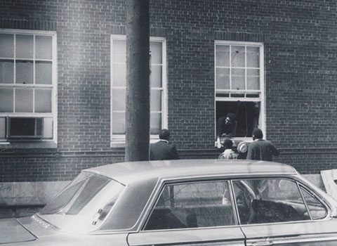 Takeover participants entering and exiting the Bursar’s Office through the window, May 3, 1968