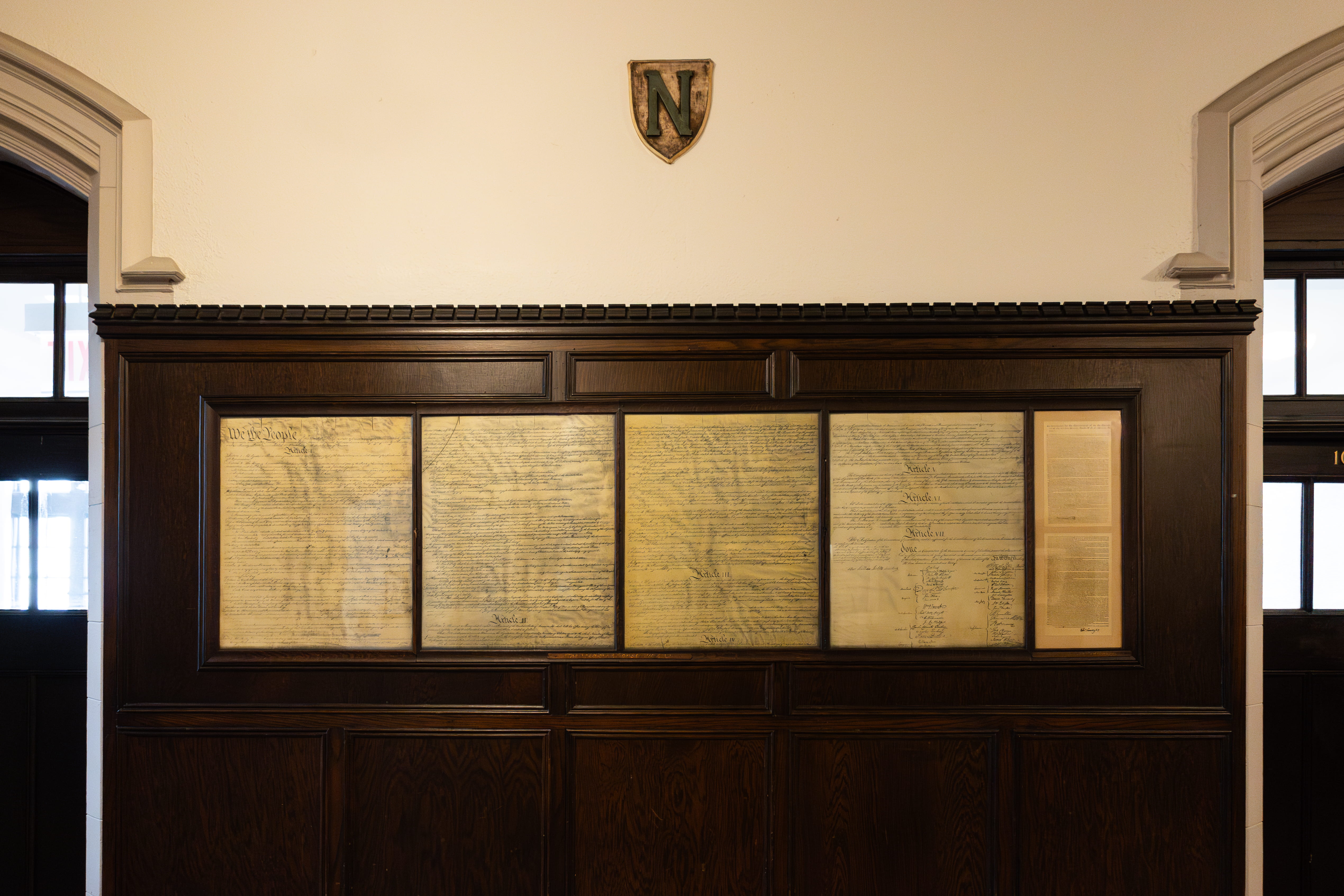 Framed constitutional facsimile stretches across five wall panels