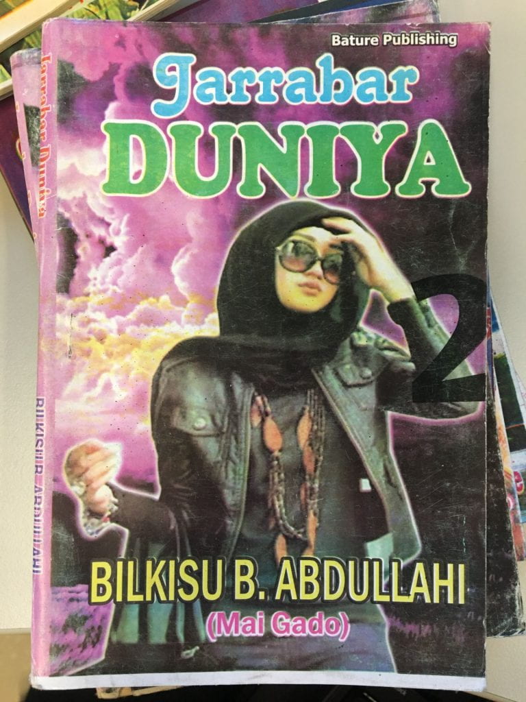 Woman in hajib on cover of Hausa fiction novel
