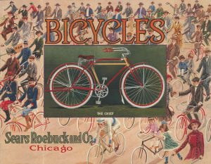 Sears bicycle catalog with an illustration of a bicycle surrounded by a crowd of cyclists