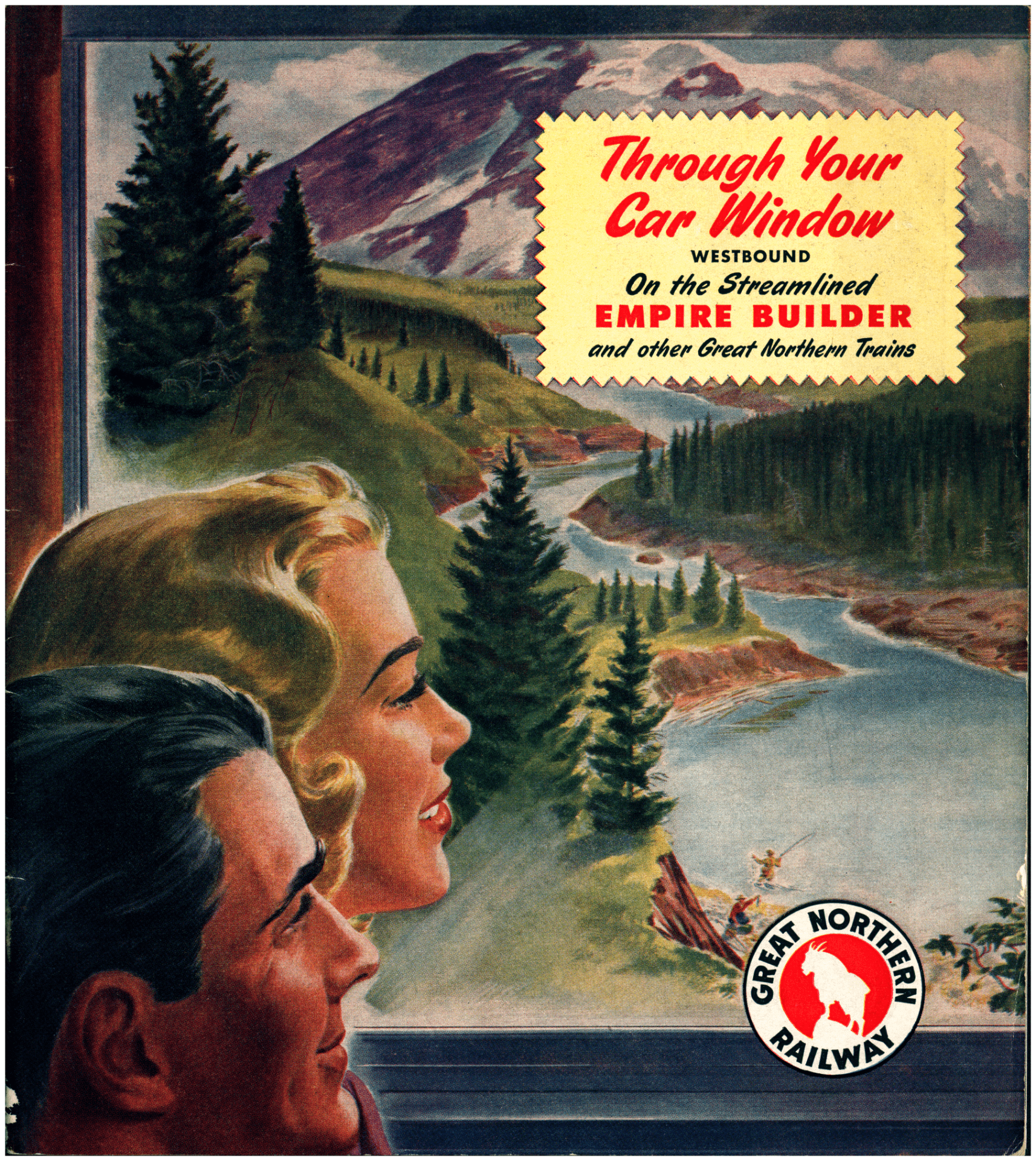 Passengers looking out train window onto river and mountains