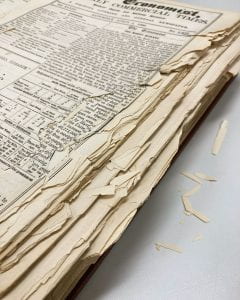 Foreedge of a book with torn edges