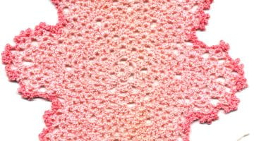 crocheted flower done in pink yarn