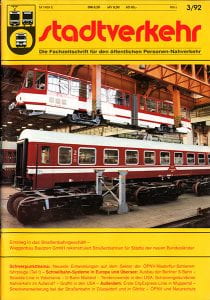 Cover of Der Stadtverkehr March 1992. A bright yellow cover with a red masthead. A photo of a bright red train car in a depot.