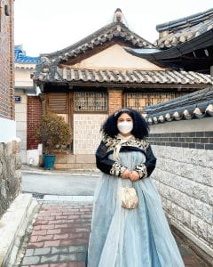 Photo: me wearing hanbok, traditional Korean clothing, for the first time in Bukchon Hanok Village. Taken by my Ewha University Peace Buddy Chaehyeon. 