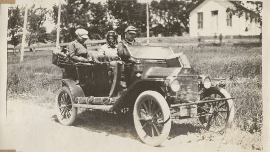 Three Passengers in a 1915 Model T