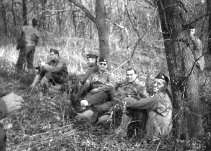 Soldiers resting at Fort Benjamin Harrison in the woods